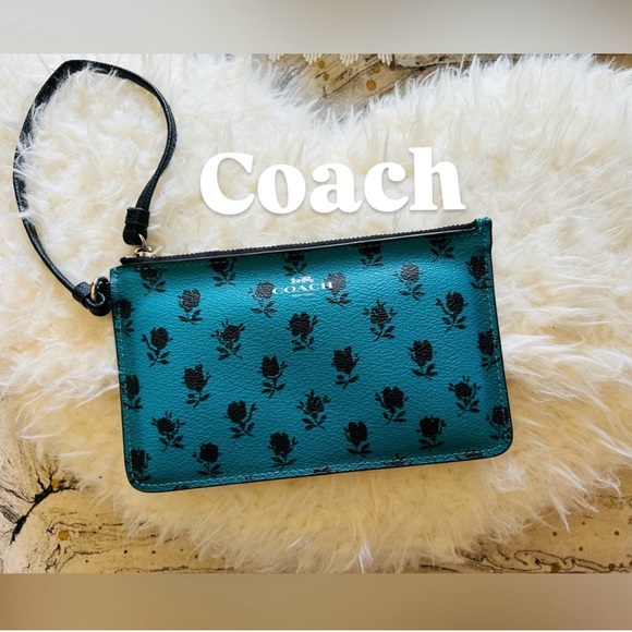 Coach Handbags - Coach wristlet turquoise with flowers
